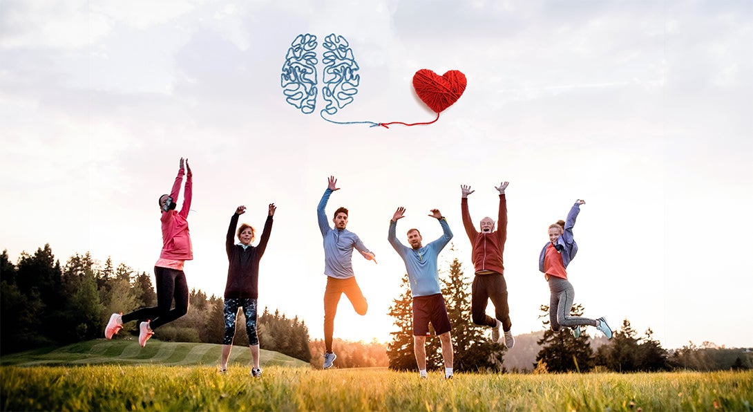 a group of people jumping for a brain and heart